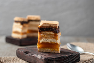 Delicious peruvian dessert called King Kong with dulce de leche and jam.