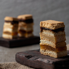 Delicious peruvian dessert called King Kong with dulce de leche and jam.