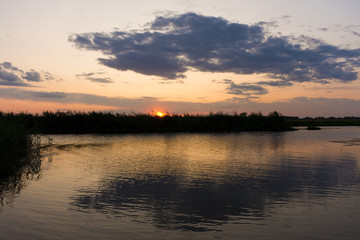 Fototapeta na wymiar Sunset reflecting at Havel, Westhavelland, Havelaue, Brandenburg, Germany