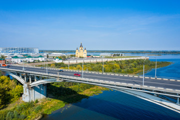 Fototapeta premium Aerial View of Alexander Nevsky Cathedral and a sports stadium in Nizhny Novgorod, vintage warehouses 