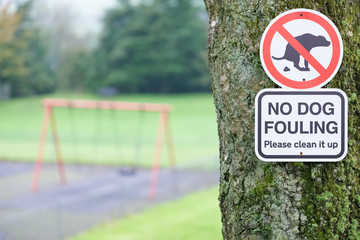 No dog fouling sign in children's public play park