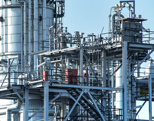 Oil and gas industrial refinery zone,Detail of equipment oil pipeline steel with valve from large oil storage tank 