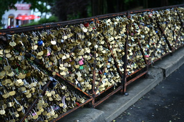 locks of love and memory hung on street fences