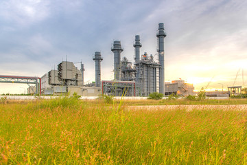 Petrochemical industrial plant power station at sunset and Twilight sky view,Amata City Industrial Thailand