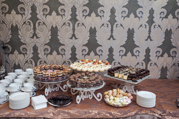 Sweet table at the wedding. Decoration trends.
