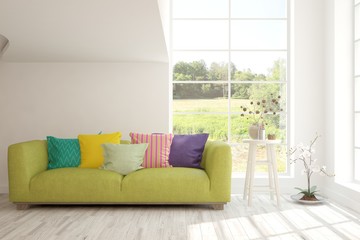 Stylish room in white color with sofa and summer landscape in window. Scandinavian interior design. 3D illustration