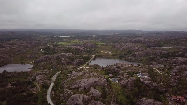 Aerial of the rocky landscape and lagoons in Egersund, Norway. DOLLY IN