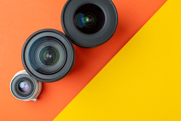 three photo lenses, on a colored background, a set of photo devices for the camera