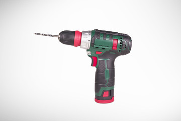 Portable electric drill isolated on white background