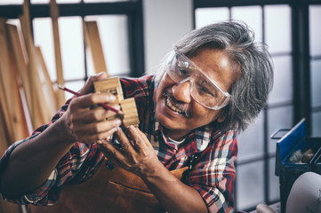The carpenter is working in the studio, Handmade woodworking