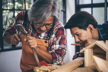 Carpenter working on woodworking machines in carpentry shop. woman works in a carpentry shop.