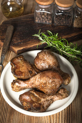 Raw marinated chicken drumsticks.