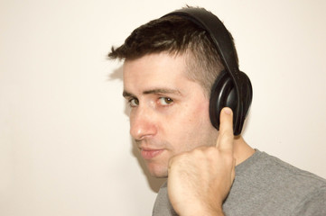 Man with black headphones.
