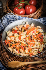 Fried chicken pieces with vegetables.