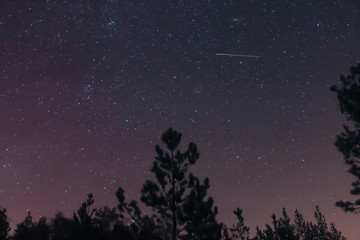 Starry night with a shooting star
