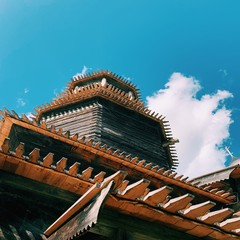 Obraz premium Wooden Building inside Museum of Wooden Structures, Russia