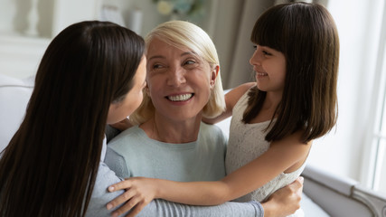 Happy 3 generations women family spending leisure time together.
