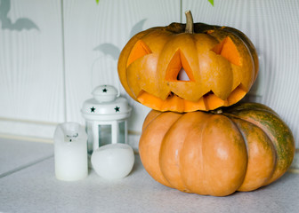 Carved pumpkins into jack-o-lanterns for halloween on black background, decoration and holidays...