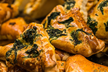 Pastries with spinach at a farmers market