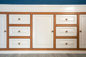 retro wooden closet with drawers closeup, modern interior minimalist style wardrobe