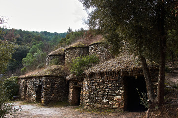 Stone hut in the middle of the forest