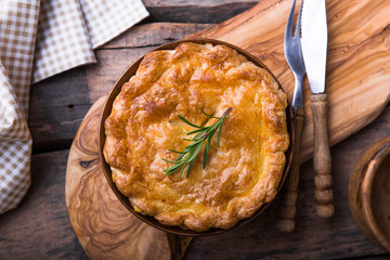 Individual chicken pot pie with puff pastry crust. top view