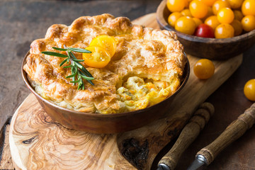 Individual chicken pot pie with puff pastry crust. top view