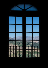 looking out of a window in rona, spain