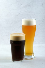 beer with glasses on a light background