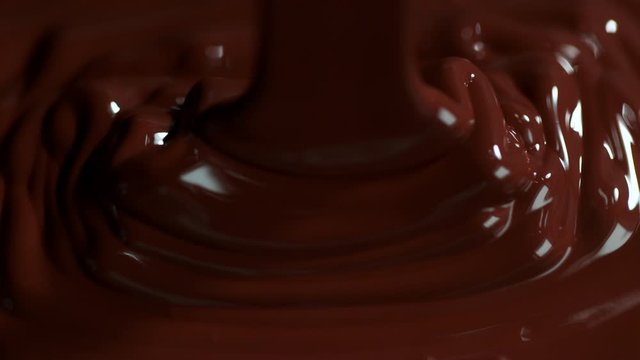 Super Slow Motion Shot of Pouring Meldet Chocolate at 1000fps. Shooted with High Speed Cinema Camera