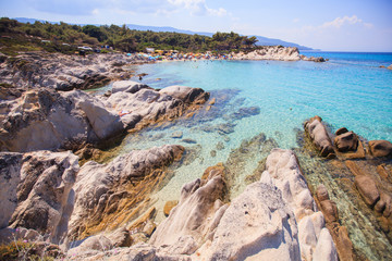 Rocky beach landscape on summer day, Beautiful turquoise color sea water  , Travel holiday destination Greece