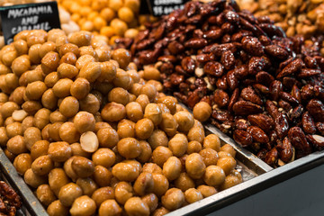 Close up of candied macadamia nuts and almonds at the farmers market stall