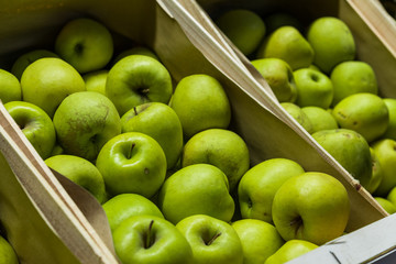 Close up food photo of organic apples at the farmers market stall