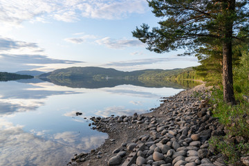 Fjord Norway with clouds and refections