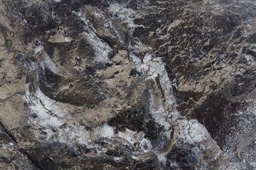 Close-up view of coal mine. Raw coal mine surface close-up. Natural black coal bar for background. Industrial coal nuggets close up