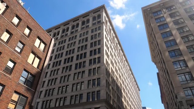 New York USA, 8th Street Broadway, Low Angle 240fps Slowmotion of Business Buildings, View From Moving Vehicle
