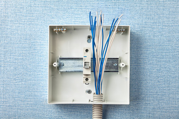 Home electrical wiring with circuit breaker panel.