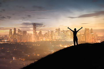 Woman feeling happy and positive in the city 