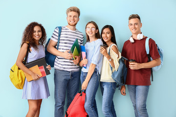 Group of students on color background