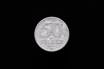 Old Hungarian 50 Filler coin from 1974, reverse. Isolated on black background