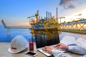Business working Engineering power oil and gas concept at offshore rig industrial background.