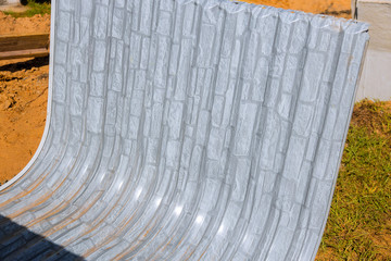 Obraz premium Window well on basement construction from window