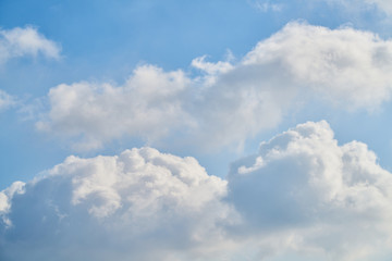 Naklejka na ściany i meble fluffy clouds and sky background