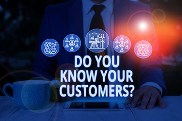 Text sign showing Do You Know Your Customers question. Business photo text asking to identify a customer s is nature Male human wear formal work suit presenting presentation using smart device