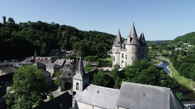 Aerial view of Durbuy Castle, world heritage located in Belgium, province of Luxembourg in the Wallonia region. Beautiful landscape with river, sunny weather during summer season.