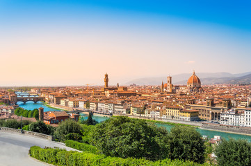 Fototapeta na wymiar Florence, Italy: scenic view on famous italian town with Duomo and Arno river at sunset