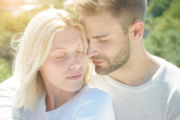 Fototapeta premium Sensual girl moaning with desire caressing boyfriend during foreplay or making love. People in love. Romantic portrait of a sensual couple in love. Love story.