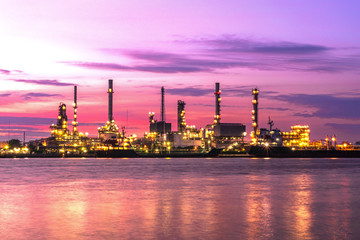 Fototapeta premium Panorama wide-angle Large oil and gas refinery industrial area and beautiful lighting at Twilight.