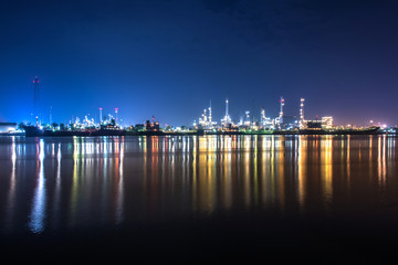 Panorama wide-angle Large oil and gas refinery industrial area at night