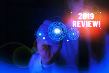 Text sign showing 2019 Review. Business photo showcasing remembering past year events main actions...